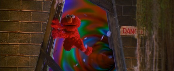 Elmo gets sucked through a portal.