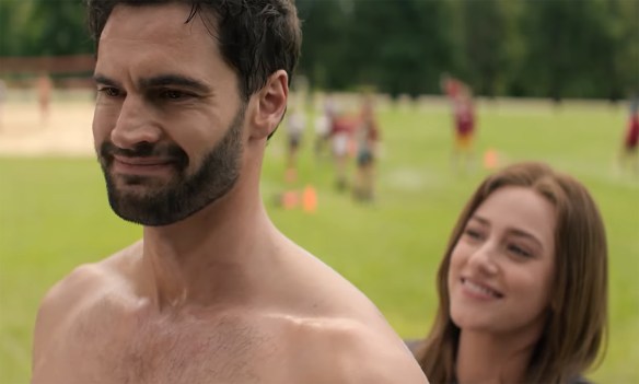 Olive tried to put sunscreen on Adam's back.