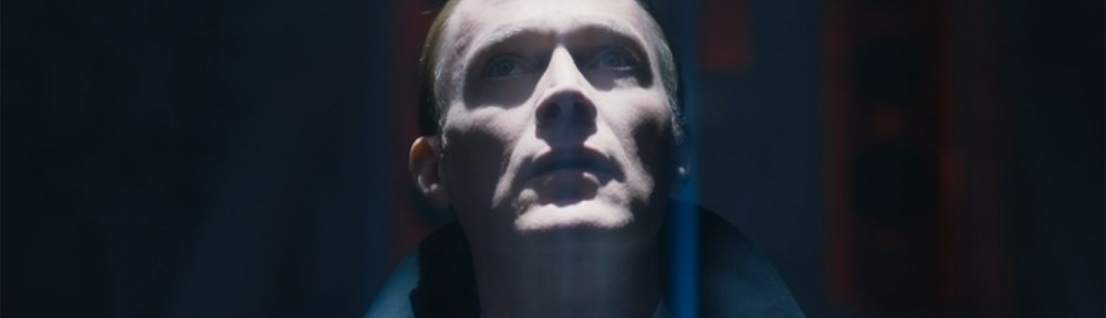 Vision looks up into a bright light.